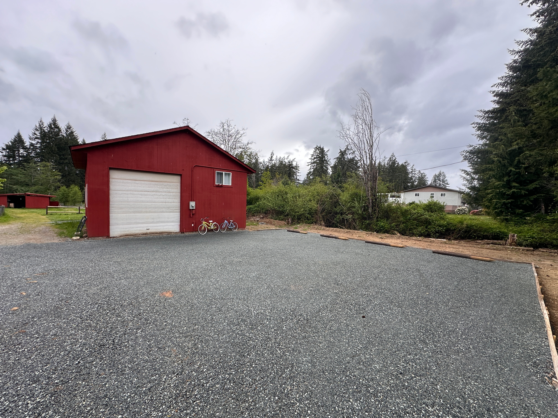 Driveway cleanup & fresh gravel — after